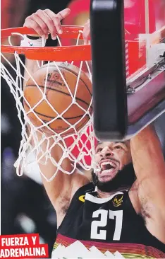  ?? Mark J. Terrill AP / ?? FUERZA Y ADRENALINA
Jamal Murray, de los Nuggets, donquea durante la segunda mitad del partido de ayer, en el que su equipo dominó 111-98 y provocó un decisivo ante los Clippers.