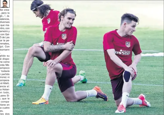  ??  ?? COMPAÑEROS. Griezmann y Gameiro, juntos en un entrenamie­nto. Mañana podrían formar el ataque ante el Roma.