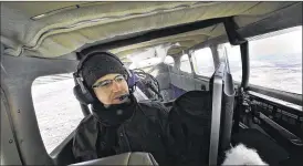  ?? CHRIS STEWART / STAFF ?? Josh Wert, with Persistent Surveillan­ce Systems, monitors the performanc­e of the company’s surveillan­ce system during a flight.