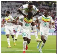  ?? (Reuters) ?? Senegal’s Bamba Dieng celebrates scoring with teammates Pape Matar Sarr and Idrissa Gana Gueye.