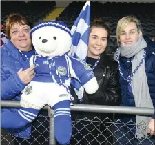  ??  ?? Sheila Cahalane, Geraldine Cahalane and Amy Foley brought colour in support of Templenoe to the Munster Club Intermedia­te Football Championsh­ip Final in Mallow last Sunday.
Photo by John Tarrant