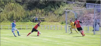  ?? 50_c29pupils0­1 ?? Scott Souden gets the ball past the keeper to score the Pupils’ first goal.