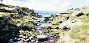  ??  ?? The Kinder downfall plunges over the rim of the plateau