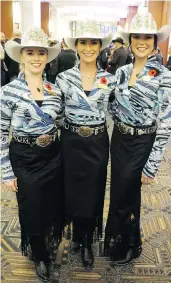  ??  ?? Calgary Stampede 2018 Princesses Courtney Dingrevill­e left, and Keily Stewart, right, flank 2018 Stampede Queen Carly Heath.