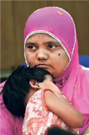  ?? ?? BILKIS BANO with her daughter during a press conference in New Delhi