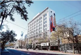  ?? Roland Li/ The Chronicle ?? Office conversion­s to housing, like one proposed for the Warfield building in San Francisco’s Mid-Market neighborho­od, could happen without a tax hit if a proposed March ballot issue passes.