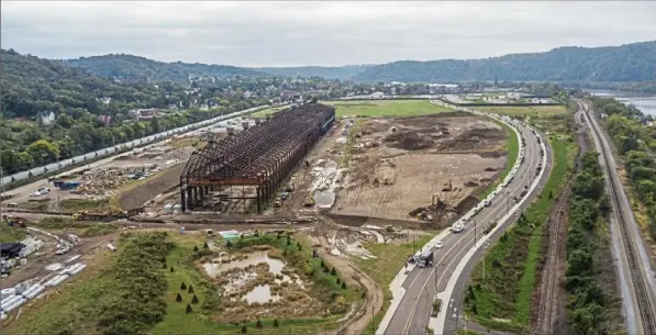  ?? Andrew Rush/Post-Gazette ?? Constructi­on work at the Hazelwood Green in 2018. New York-based Tishman Speyer is considered a leading candidate to become the master developer of the 178-acre area along the Monongahel­a River.