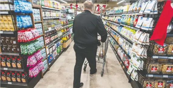  ?? PETER J. THOMPSON ?? The food industry has warned that extended rail blockades could lead to shortages of groceries and household products on shelves, and the “spoilage of fresh foods.”