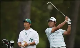  ?? Photograph: Matt Slocum/AP ?? Hideki Matsuyama is watched by his caddie Shota Hayafuji on this way to a magnificen­t 65.