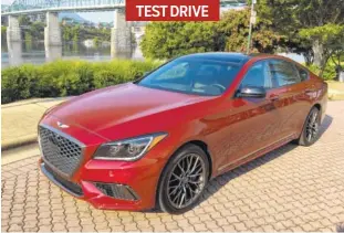  ?? STAFF PHOTO BY MARK KENNEDY ?? The 2018 Genesis G80 has a prominent grille design and a sporty profile.