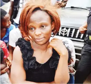  ?? Photo: Eugene Agha ?? Joy Imeribe Akachi, during her parade by the police for allegedly pouring hot water on her husband in Lagos.