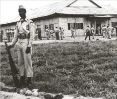  ??  ?? UN guards outside the building where the armistice was signed on 27 July 1963