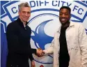  ?? ?? > Steve Morison welcomes new signing Ebou Adams to Cardiff PICTURE: Cardiff City FC