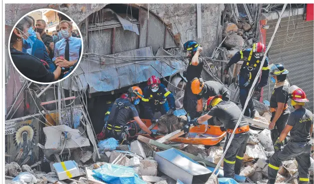  ??  ?? The Lebanese civil defence use a dog to search for victims and survivors in the rubble and, inset, French President Emmanuel Macron meets the locals.
Picture: AFP