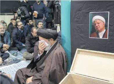  ?? MAJID SAEEDI / GETTY IMAGES ?? Mourners gather at the Jamaran mosque during the mourning ceremony for Akbar Hashemi Rafsanjani Monday in Tehran. Rafsanjani, who was 82, was a pivotal figure in the foundation of the Islamic republic in 1979.