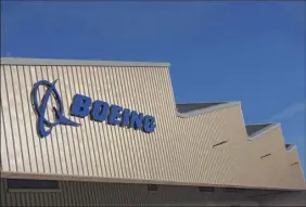  ?? Oli scarff / Getty images ?? shares in Boeing fell 6.6 percent to $335.59 on Monday as industrial­s sank amid another bout of market volatility.