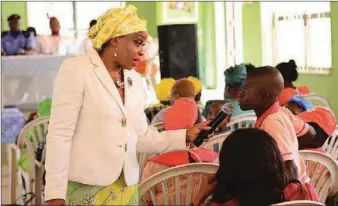  ??  ?? Founder, Live Abundantly Empowermen­t Initiative, Dr Ama Onyerinma addressing some pupils in Kosofe Local Government of Lagos State during a sensitizat­ion programme on community security & child protection...recently