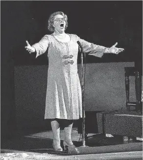  ??  ?? Kate Smith sings “God Bless America” before a Stanley Cup playoff game between the New York Islanders and the Philadelph­ia Flyers in May 1975. AP Think tank New America