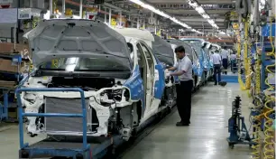  ?? Reuters ?? A General Motors India plant in Halol. While GM will indeed stop selling vehicles in the country, it still plans to keep operating its technology centre in Bangalore. —