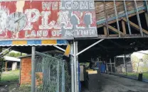  ?? Edward A. Ornelas / San Antonio Express-News ?? The entrance to Playland Park as it looked in August 2003. The park at 2222 N. Alamo St. at Broadway closed in 1980.