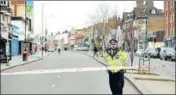  ?? REUTERS ?? A police officer near the site where the stabbing took place.