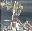  ?? JERRY LARSON — THE ASSOCIATED PRESS ?? Stanford forward Harrison Ingram draws a foul by Baylor’s Jeremy Sochan as he attempts to shoot Saturday. Baylor won by 38 points.