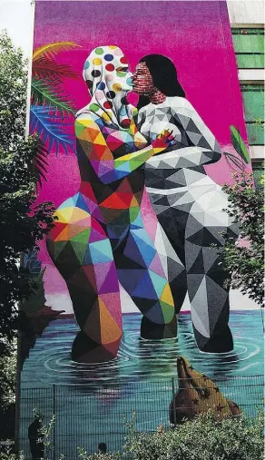  ??  ?? Spanish street artist Okuda San Miguel will be working on a vivid, colourful mural six storeys high over 83 Avenue until Wednesday.