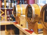  ??  ?? Casks of Italian wine tempt the visitor