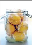  ?? TRIBUNE NEWS SERVICE ?? JAR OF SUNSHINE: Preserved lemons will exceed your expectatio­ns.