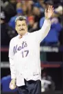  ?? David J. Phillip / Associated Press ?? Keith Hernandez waves before throwing out the ceremonial first pitch before Game 1 of the 2015 NLCS in New York.