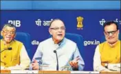  ??  ?? Finance Minister Arun Jaitley along with members of the GST Council Santosh Kumar Gangwar and Hasmukh Adhia