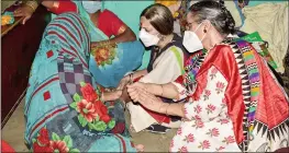  ??  ?? CPI(M) politburo member Brinda Karat meets the family members of the 19-year-old Dalit woman who died after being allegedly gang-raped, at Bulgadi village in Hathras on Tuesday —PTI