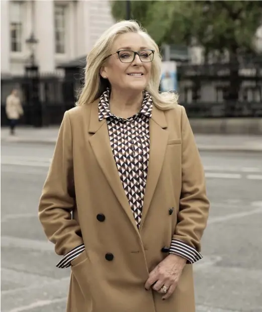  ??  ?? Eleanor wears frames by GANT GA4024, €199 from Specsavers; coat, €210 and shirt, €40, both M&S