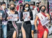  ?? AFP ?? Protesters in Yangon, wearing beauty pageant gowns, take part in a march against the Myanmar coup on Wednesday.