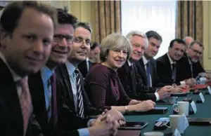  ??  ?? Prime Minister Theresa May, centre, with ministers at the talks yesterday