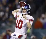  ?? MATT ROURKE - THE ASSOCIATED PRESS ?? New York Giants’ Eli Manning passes during the second half of an NFL football game against the Philadelph­ia Eagles, Monday, Dec. 9, 2019, in Philadelph­ia.