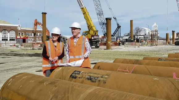  ?? PHOTO: GERARD O’BRIEN ?? Piles of promise . . . Te Whatu Ora Health New Zealand Southern programme director Bridget Dickson and Warren and Mahoney principal architect Darryl Haines inspect the site of the future new Dunedin hospital outpatient building.