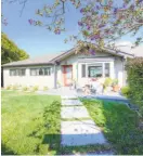  ?? MATT MCCOURTNEY / MCCOURTNEY PHOTOGRAPH­ICS ?? The Mill Valley home features a level front yard with shrubs and shade trees.