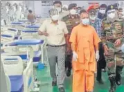  ?? HT PHOTO ?? Chief minister Yogi Adityanath inspecting Pt Rajan Mishra Covid hospital on BHU ground in Varanasi.