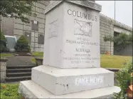  ?? Alex von Kleydorff / Hearst Connecticu­t Media ?? The statue of Christophe­r Columbus at the Heritage Wall on West Avenue in Norwalk was found to have the slogan “fake news” stenciled on its base on Sunday.