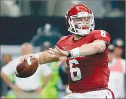  ?? The Associated Press ?? Oklahoma quarterbac­k Baker Mayfield was selected first overall by the Cleveland Browns in Thursday’s NFL draft.