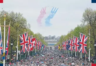  ?? PHOTO: GETTY. ?? The RAF Aerobatic Team, otherwise known as The Red Arrows, fly over The Mall.