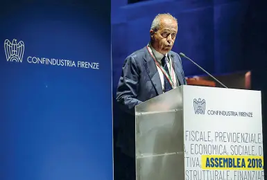  ??  ?? L’intervento del presidente di Confindust­ria Firenze Salvadori. A destra, un’immagine da «Prova d’Orchestra» di Fellini