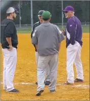  ?? SUBMITTED PHOTO ?? St. Charles High School first-year head baseball coach Robby Zayas, center, converses with McDonough baseball coach Mike Lydon, right, prior to last week’s contest. Zayas played at McDonough for Lydon from 2002 to 2005 and also with the Southern...