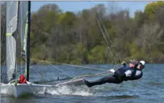  ??  ?? Evan DePaul and William Jones of the Royal Hamilton Yacht Club, pictured practising on the harbour, are gunning for the Olympics.