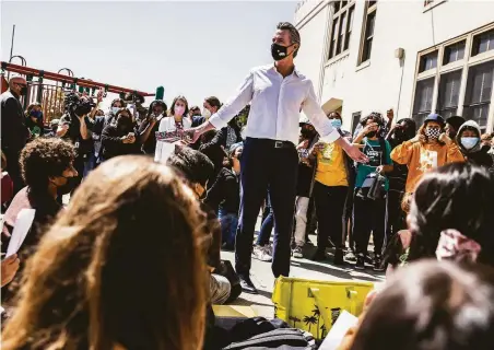  ?? Stephen Lam / The Chronicle ?? California Gov. Gavin Newsom visits the Melrose Leadership Academy in Oakland the day after surviving the recall election.