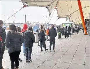  ??  ?? Even with a little bit of snow in the air, the Designer Outlet was busy first thing on Monday morning