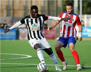  ?? ?? Bath’s Mo Touray shields the ball