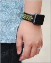  ??  ?? Ijoe’s accessorie­s include this Apple Watch.