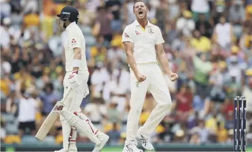  ?? PICTURE: CAMERON SPENCER/GETTY ?? 0 Australia’s Josh Hazlewood celebrates after taking the wicket of England’s Joe Root.